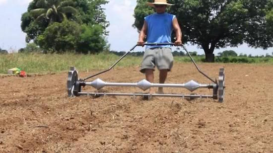 Mechanical corn planter