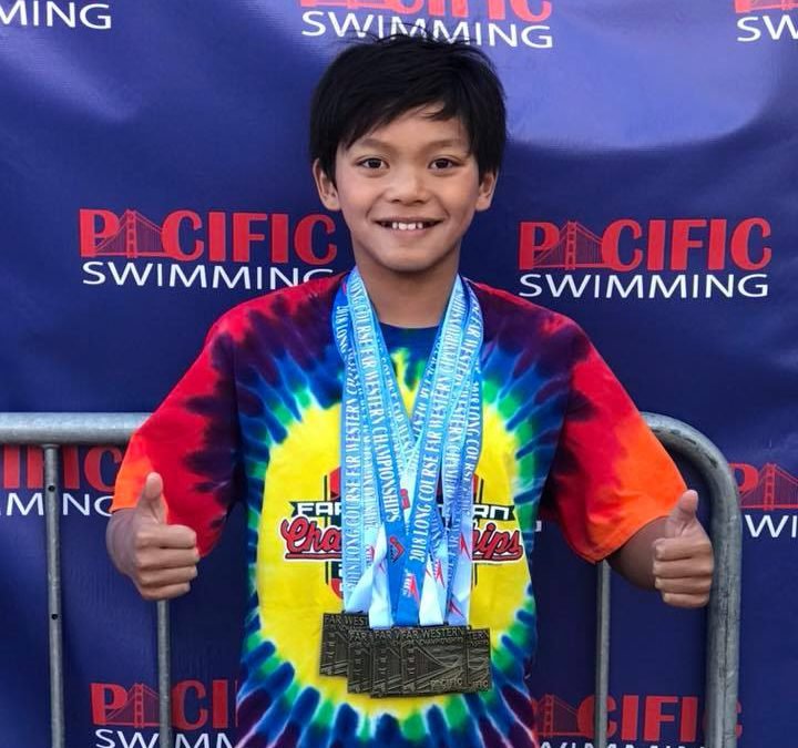 10 year-old Clark Kent breaks Michael Phelps swim record, gets congrats from Olympian