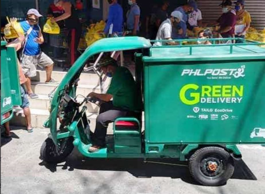 PHLPost deploys “Green Delivery” electric vehicles for relief operations in Pasig City