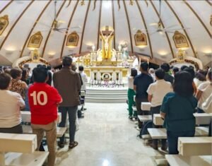 Catholic faithful attend Simbang Gabi dawn Mass as churches livestream the Christmas novena in the Philippines