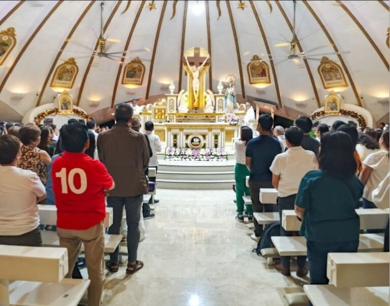 Catholic faithful attend Simbang Gabi dawn Mass as churches livestream the Christmas novena in the Philippines