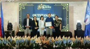 FDCP Technical Consultant Seymour Sanchez accepting the Gawad Kaagapay Award during the 6th Gawad Kaagapay ceremony in Quezon City