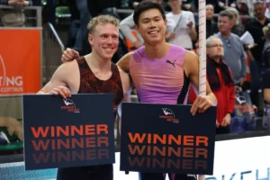 Filipino pole vaulter EJ Obiena and Dutch athlete Menno Vloon hold winner boards after sharing first place at the Internationales Springer-Meeting Cottbus in Germany