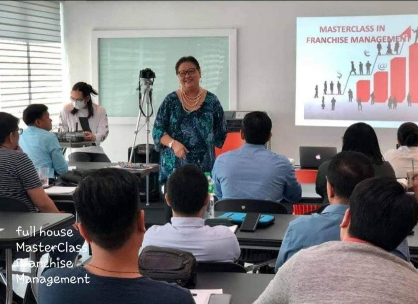 Butz Bartolome and Lyndah Bartolome leading franchise workshop in Makati Philippines